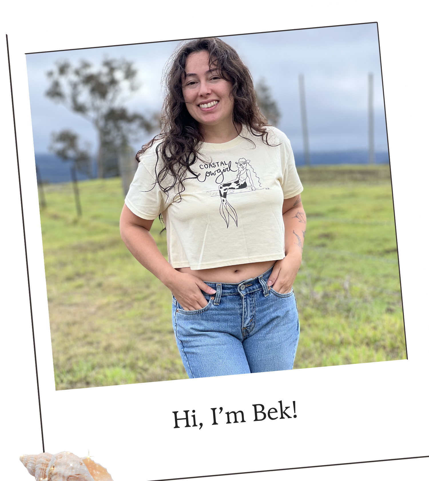 Bek smiling in a coastal cowgirl shirt