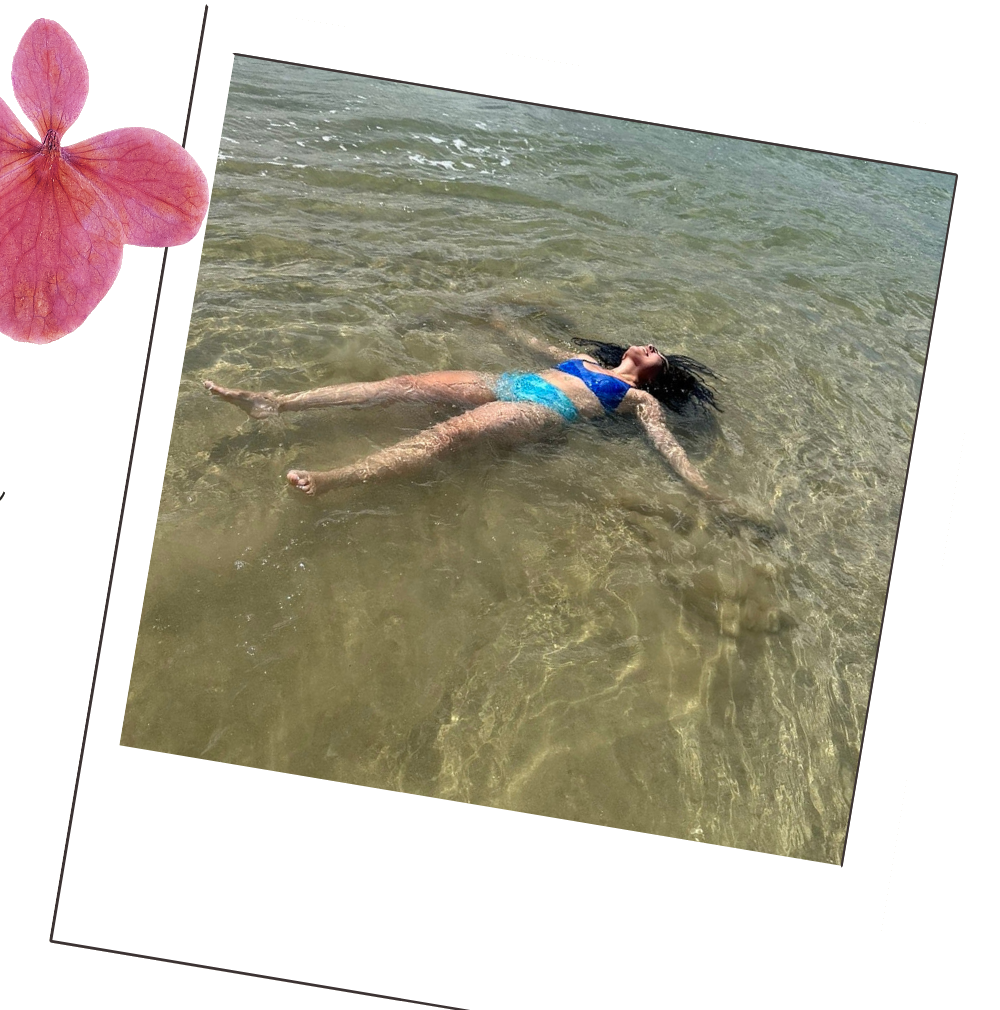 Bek floating in clear shallow water
